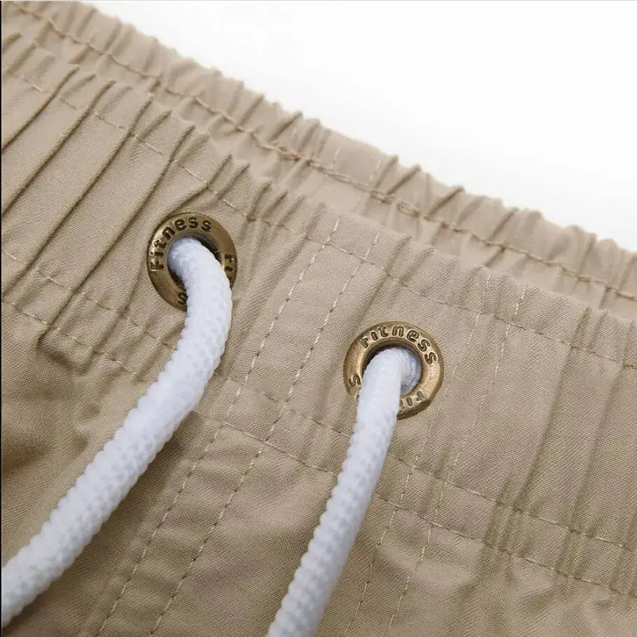Swim trunks for men - quick dry board shorts with pockets for surfing and beach